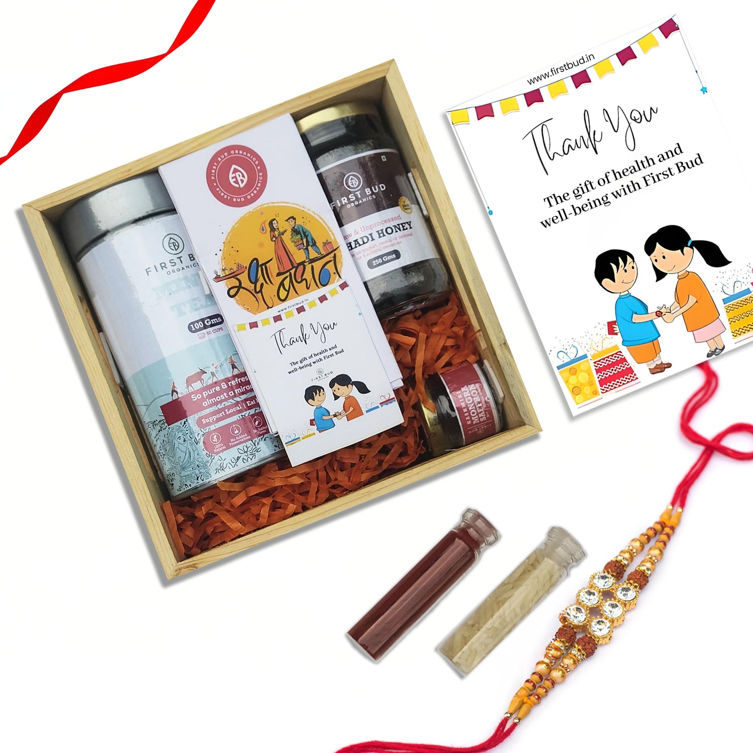 Rakhi Gift Hamper - Lemongrass Mint Herbal Tea, Pahadi Multiflower Honey, Kashmiri Saffron,Chocolates & Rakhi Set