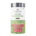tulsi green tea container front view, organic herbal tea blend, first bud organics packaging, immunity boosting tulsi tea, natural antioxidant wellness drink
