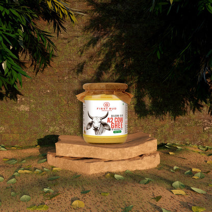 First Bud A2 Gir cow bilona ghee jar on stones outdoors